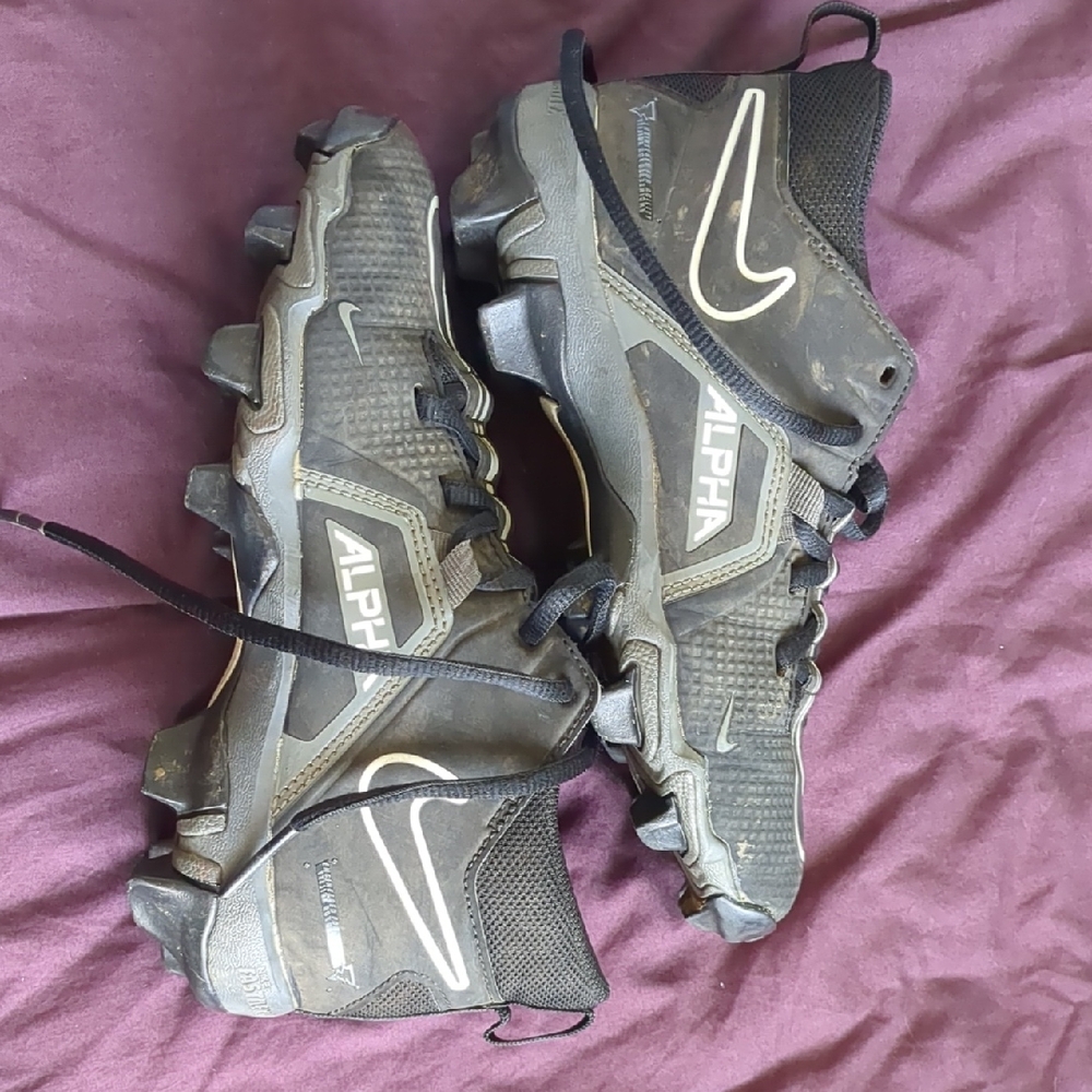Nike Alpha Kid's Black Athletic Cleats with White Accents